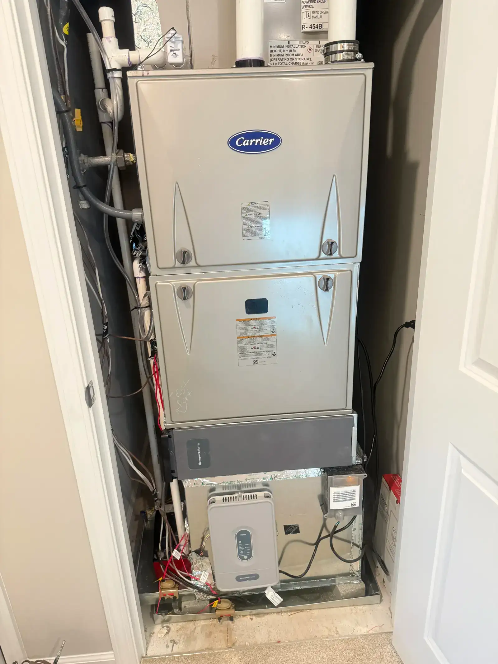 HVAC technician answering a service call